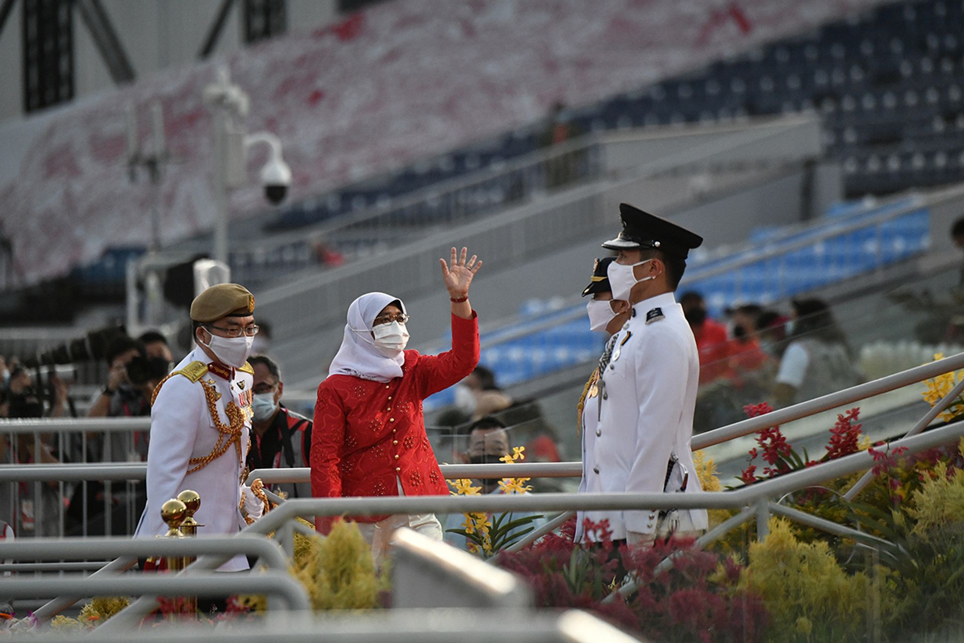 President Halimah waving at participants during the National Day Parade on Aug 21, 2021. ST PHOTO: ARIFFIN JAMAR