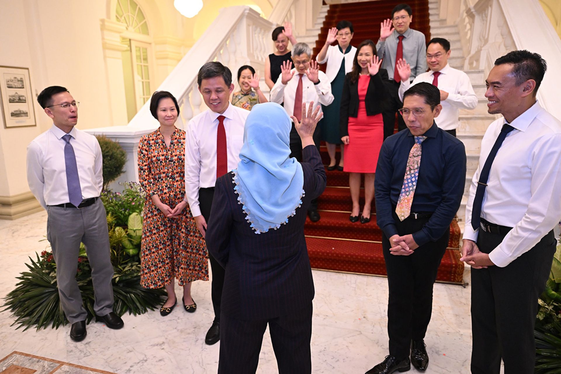 Madam Halimah waving at political leaders and members of the senior management of the Ministry of Education at the Istana during the Teachers’ Day Reception on Aug 31, 2023. ST PHOTO: AZMI ATHNI
